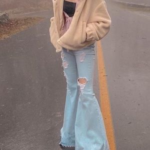 vibrant MIU bell bottom ripped jeans